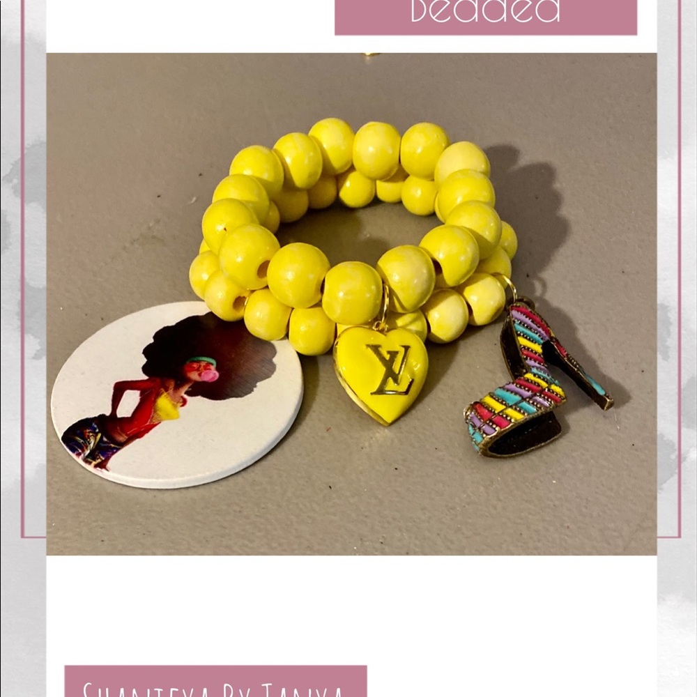 Beaded bracelet with charms